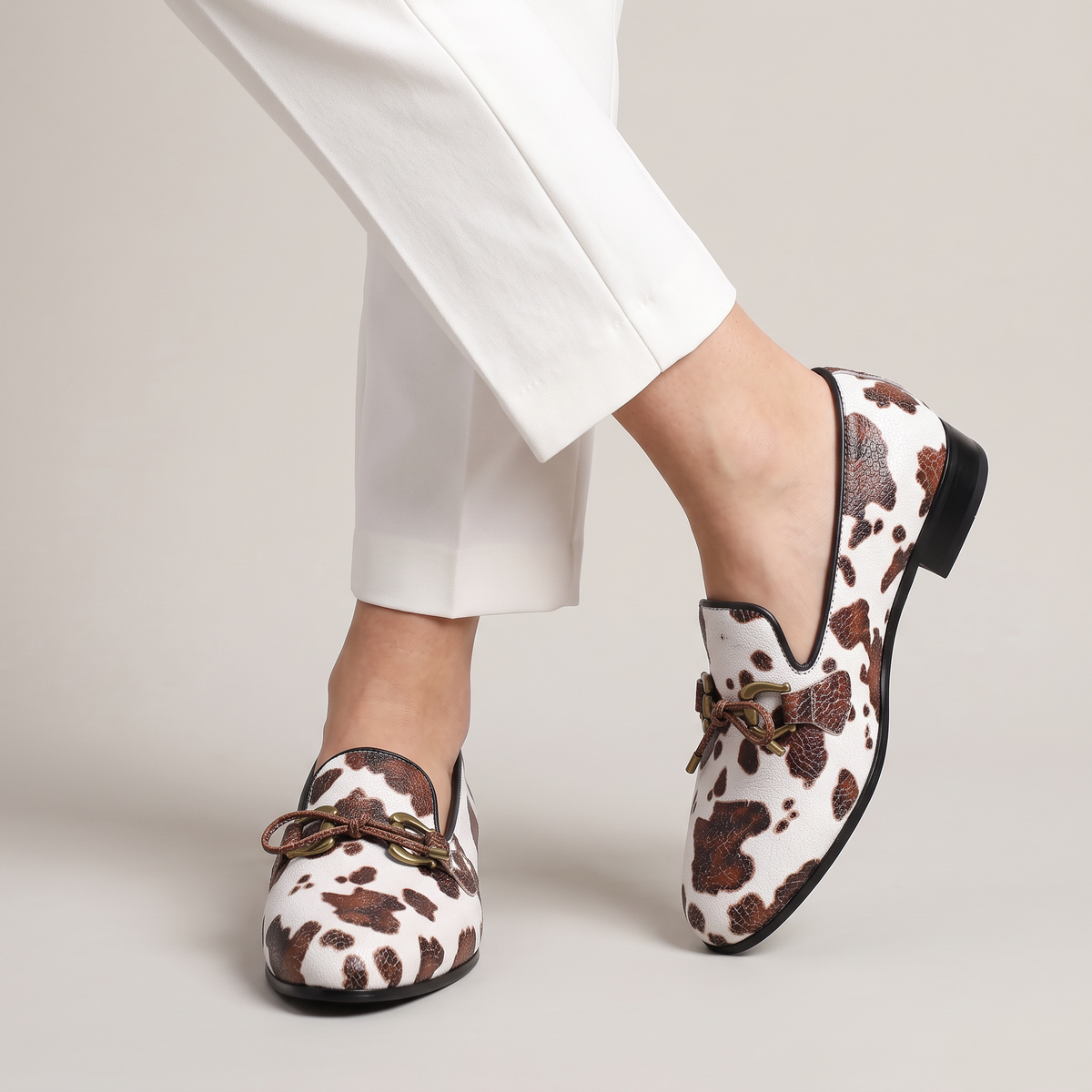 Women’s Cow Print Slip-On Loafers
